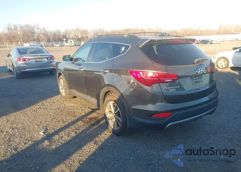 2014 Hyundai Santa Fe Sport 2.0L Turbo z USA, uszkodzony, nr VIN 5XYZUDLA2EG185290